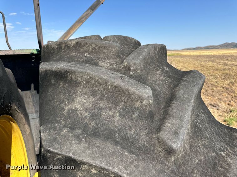 image for item DD3217 1999 John Deere 9300 4WD tractor