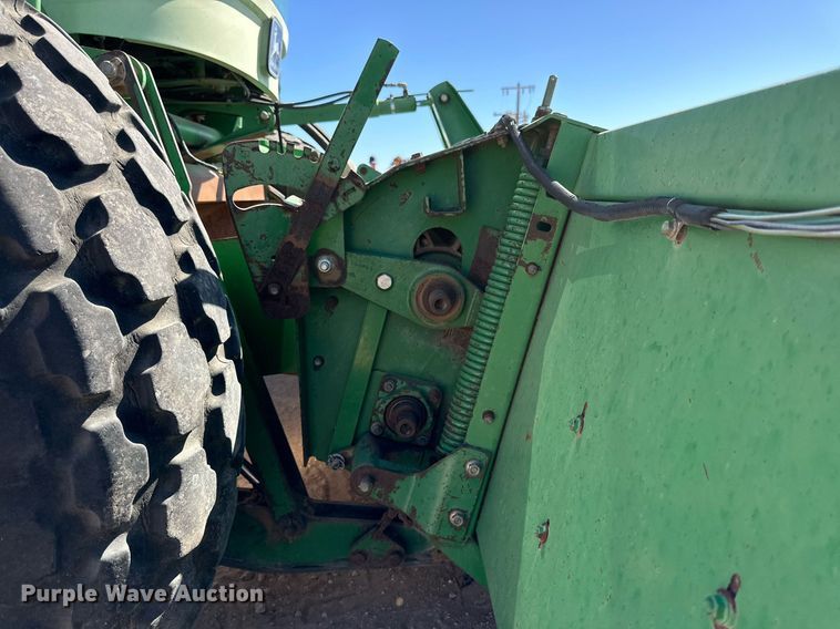 image for item DD3269 1997 John Deere 4890 swather / windrower