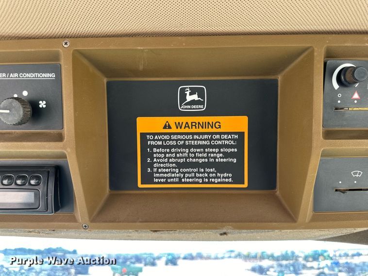 image for item DD3269 1997 John Deere 4890 swather / windrower