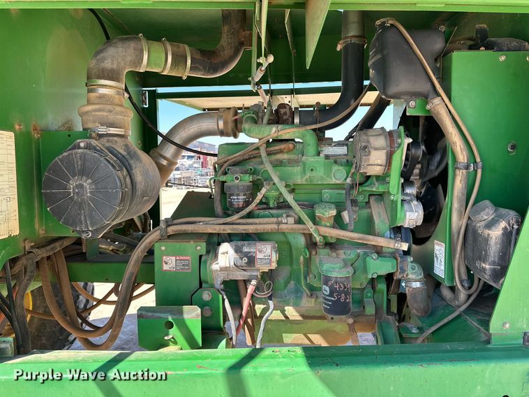 image for item DD3269 1997 John Deere 4890 swather / windrower