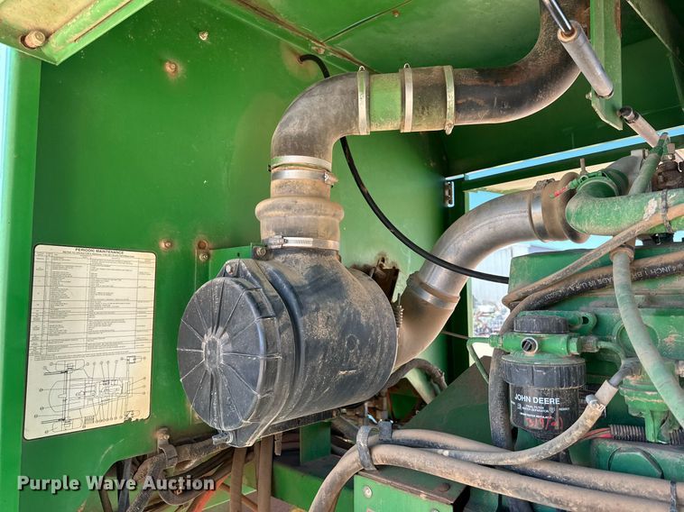 image for item DD3269 1997 John Deere 4890 swather / windrower