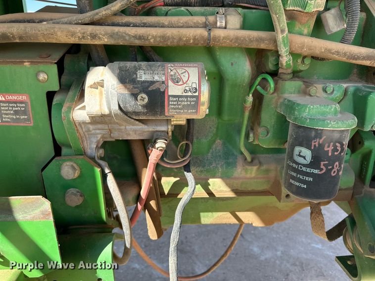 image for item DD3269 1997 John Deere 4890 swather / windrower