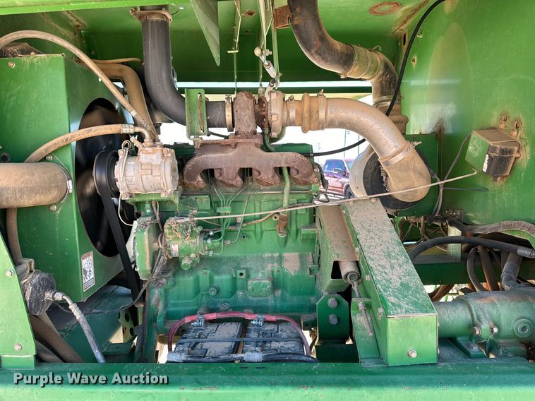 image for item DD3269 1997 John Deere 4890 swather / windrower
