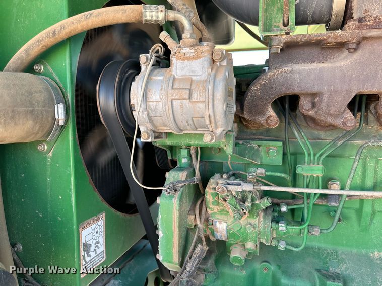 image for item DD3269 1997 John Deere 4890 swather / windrower