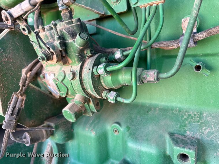 image for item DD3269 1997 John Deere 4890 swather / windrower