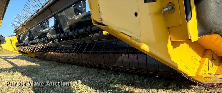 image for item DX3586 2014 New Holland H7150 swather / windrower