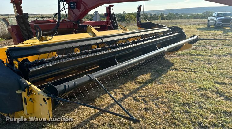 image for item DX3586 2014 New Holland H7150 swather / windrower