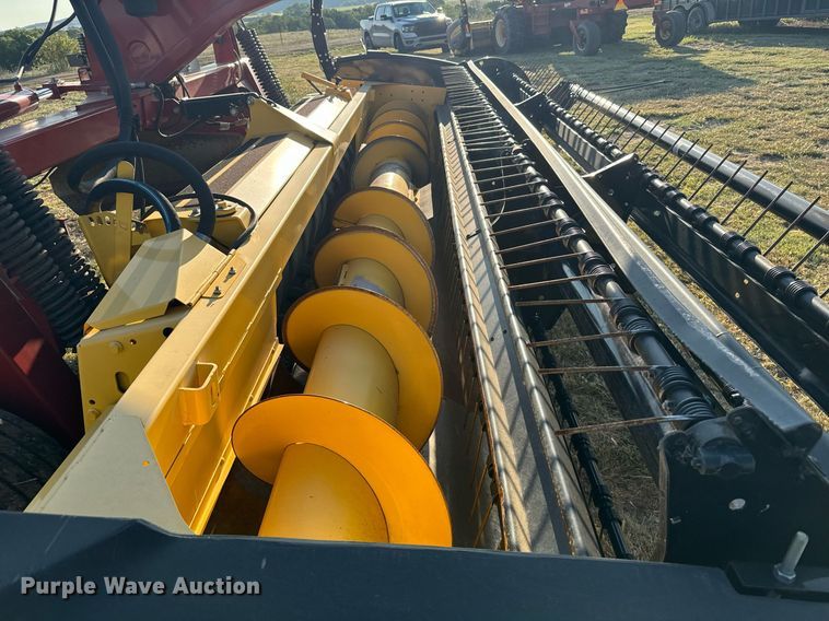 image for item DX3586 2014 New Holland H7150 swather / windrower