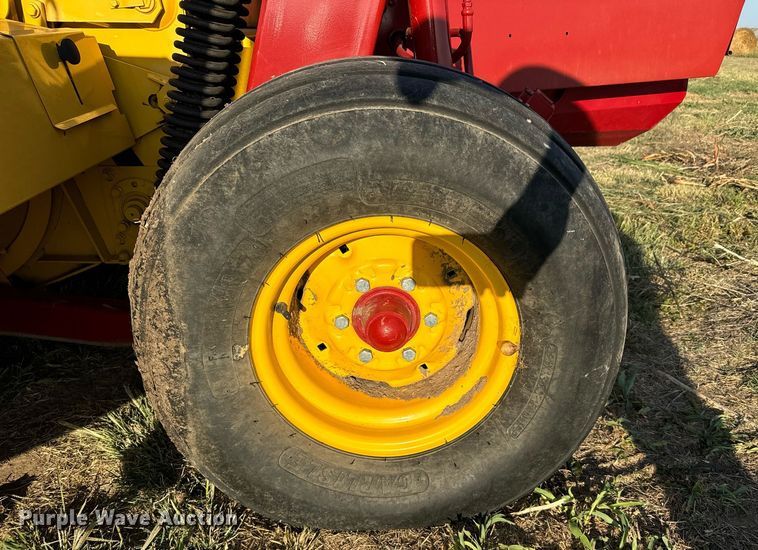 image for item DX3586 2014 New Holland H7150 swather / windrower