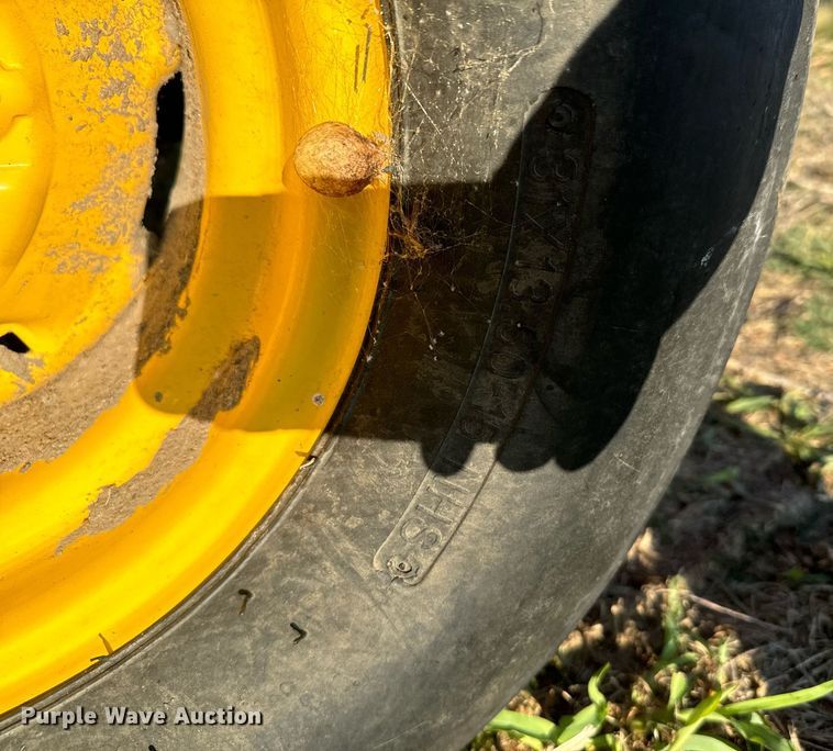 image for item DX3586 2014 New Holland H7150 swather / windrower