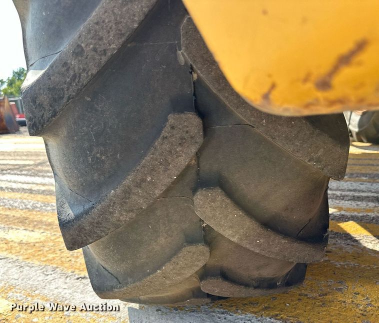 image for item DL0437 2003 John Deere 304H wheel loader