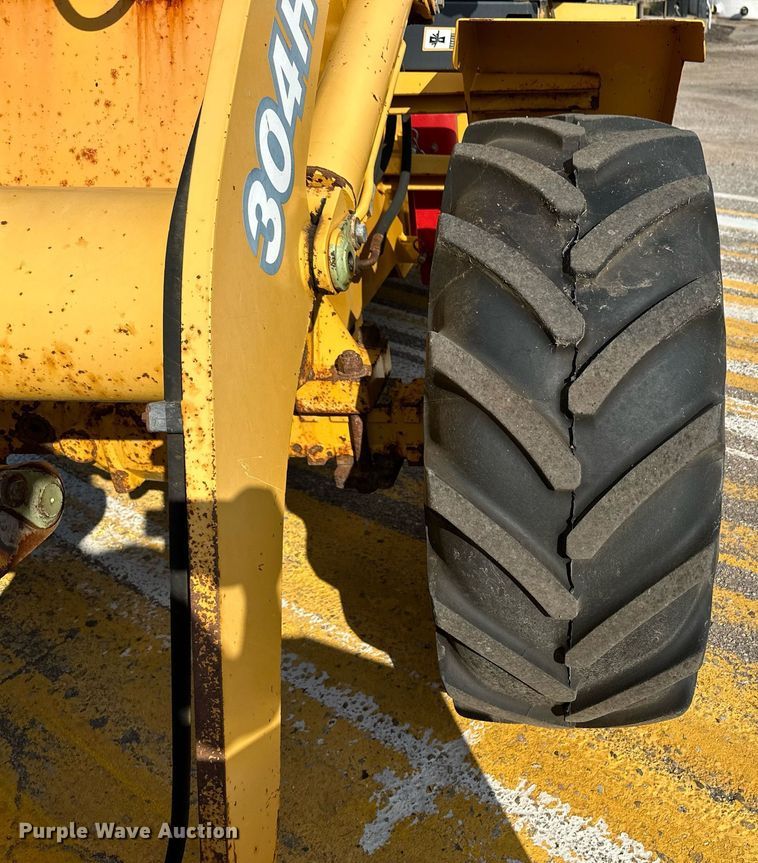image for item DL0437 2003 John Deere 304H wheel loader