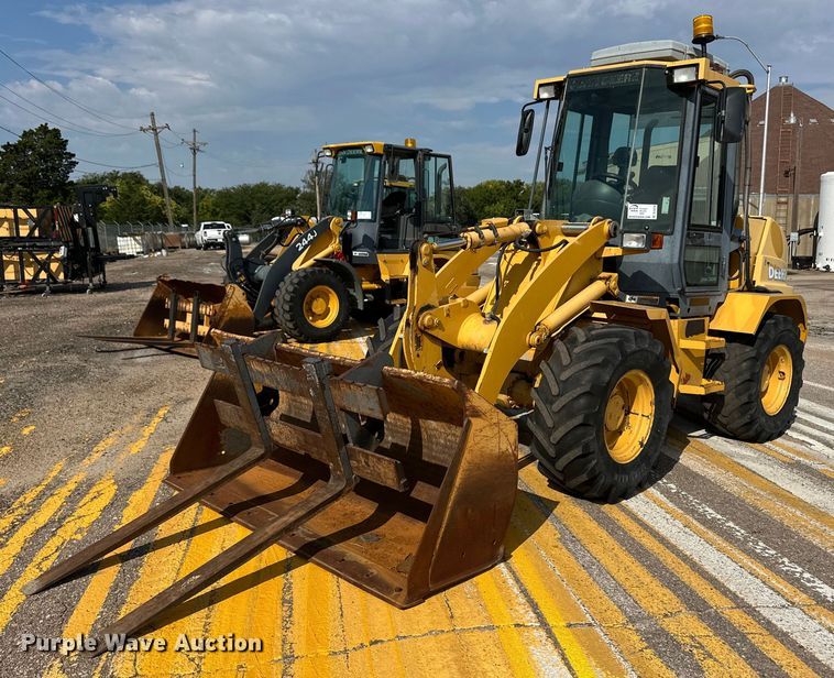 image for item DL0438 2003 John Deere 304H wheel loader