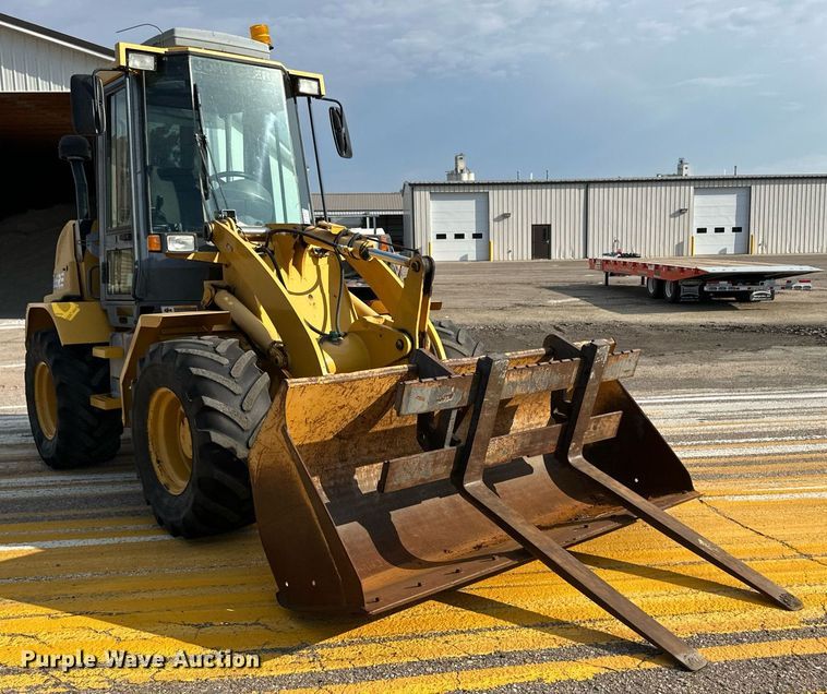 image for item DL0438 2003 John Deere 304H wheel loader