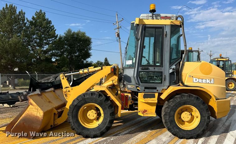 image for item DL0438 2003 John Deere 304H wheel loader