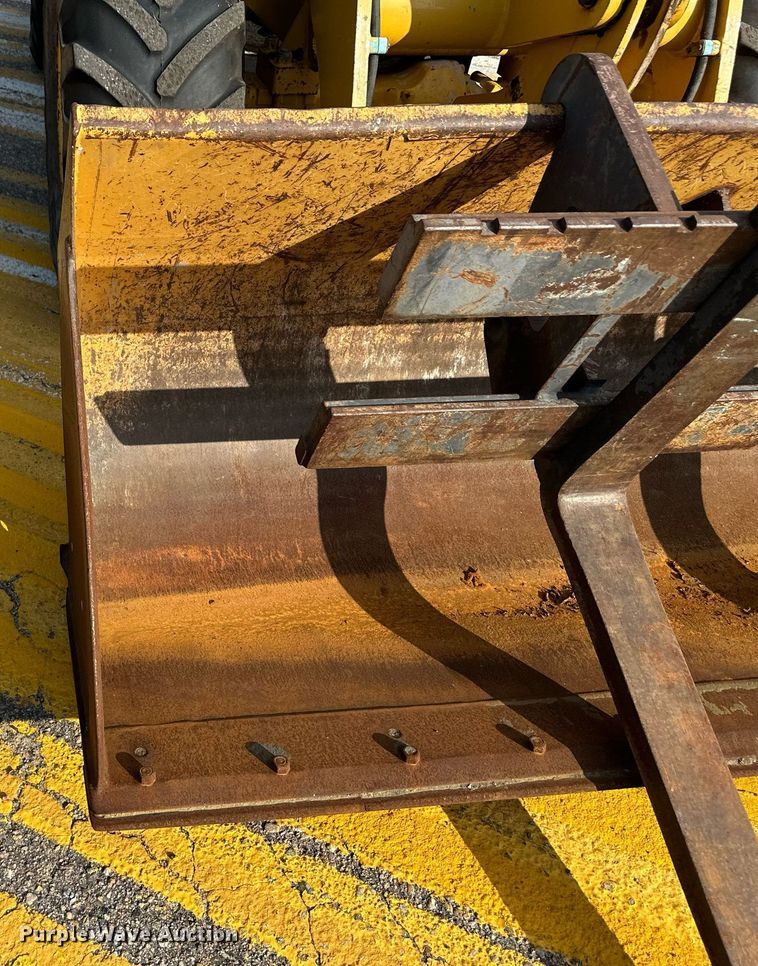 image for item DL0438 2003 John Deere 304H wheel loader