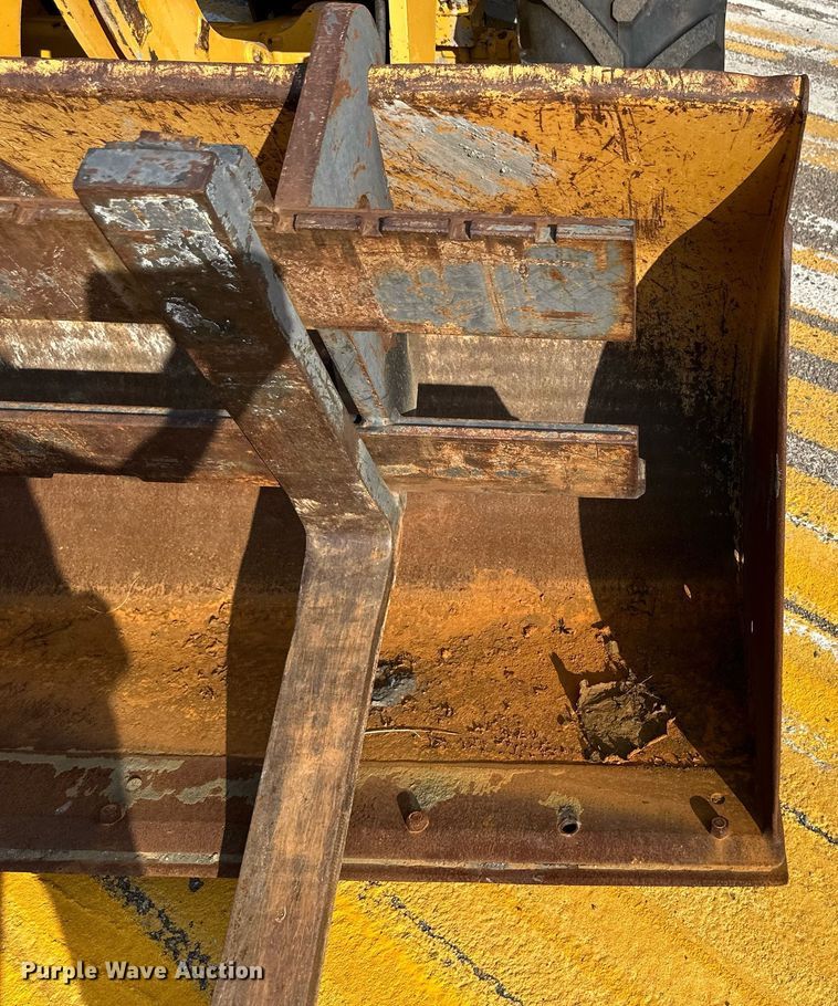 image for item DL0438 2003 John Deere 304H wheel loader