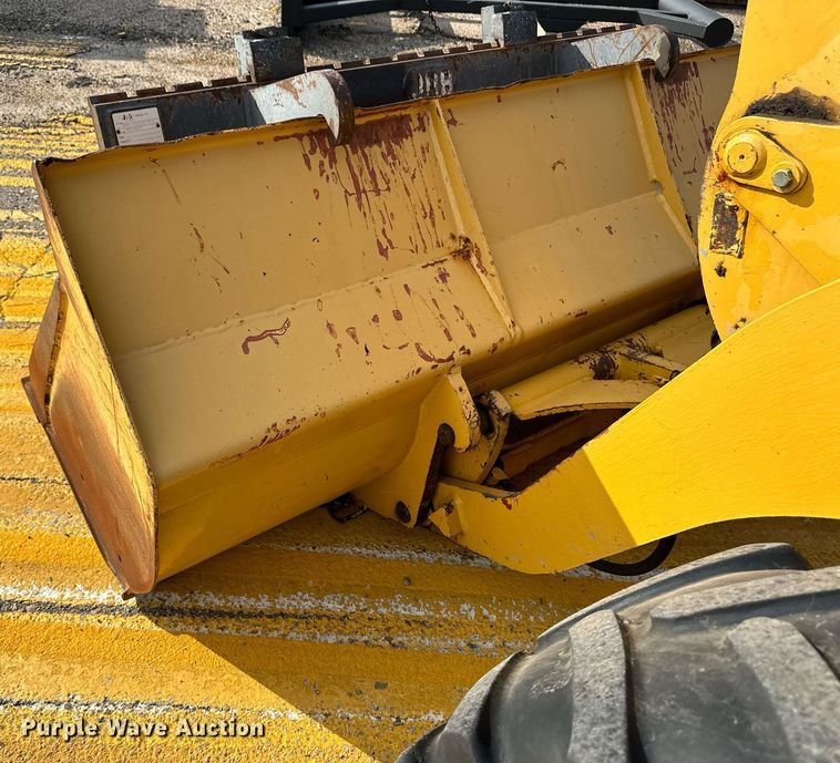 image for item DL0438 2003 John Deere 304H wheel loader