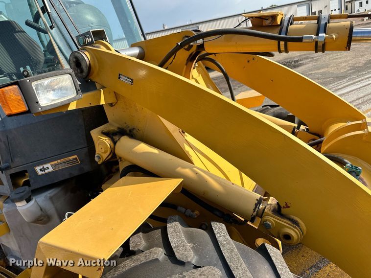 image for item DL0438 2003 John Deere 304H wheel loader