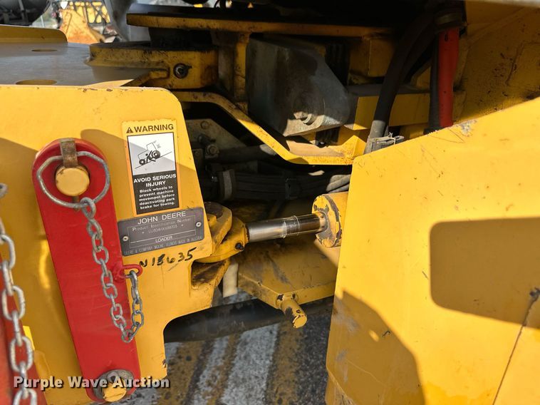 image for item DL0438 2003 John Deere 304H wheel loader