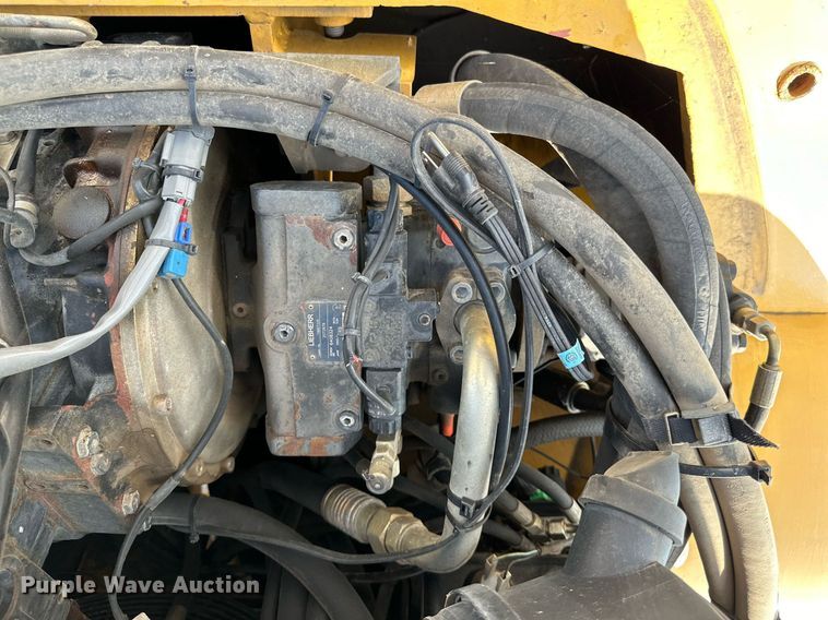 image for item DL0438 2003 John Deere 304H wheel loader