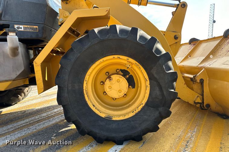 image for item DL0438 2003 John Deere 304H wheel loader