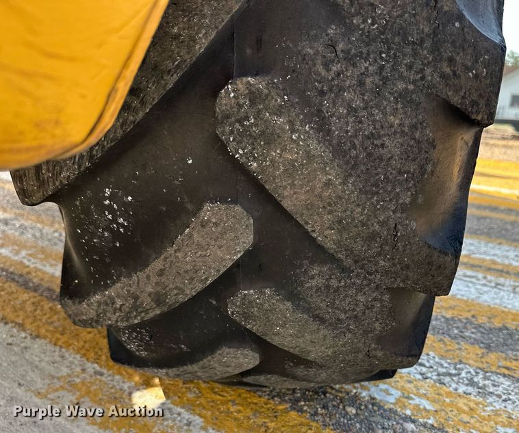 image for item DL0438 2003 John Deere 304H wheel loader