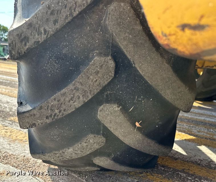 image for item DL0438 2003 John Deere 304H wheel loader