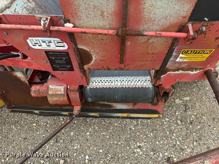 image for item DL0445 2006 HTC 2000 shouldering machine