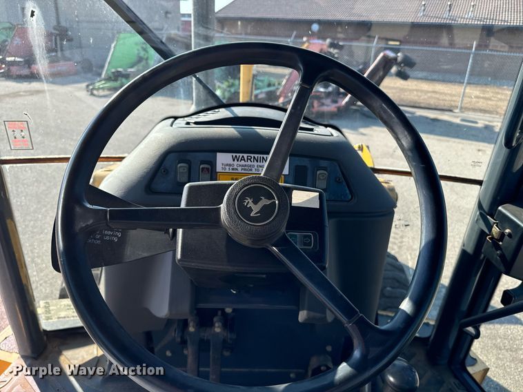 image for item DO1679 2004 John Deere 310G backhoe