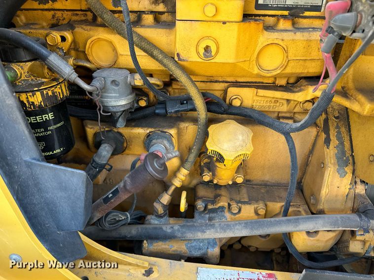 image for item DO1679 2004 John Deere 310G backhoe