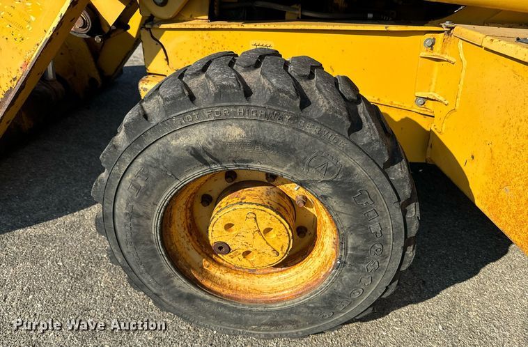 image for item DO1679 2004 John Deere 310G backhoe