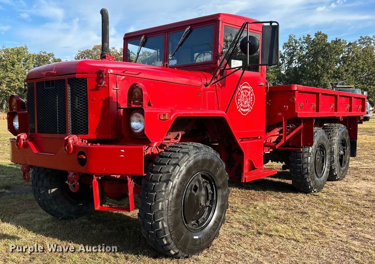 image for item DO7546 1999 AM General flatbed truck