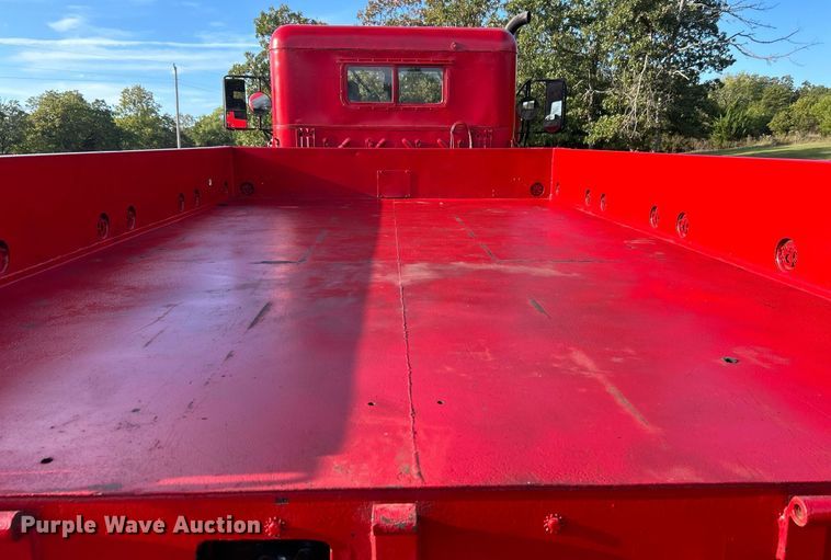 image for item DO7546 1999 AM General flatbed truck