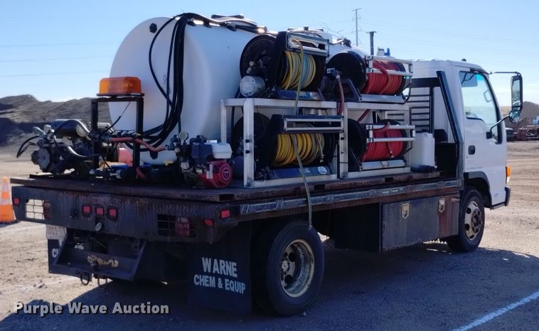 image for item DQ6172 2002 Isuzu  NPR flatbed truck