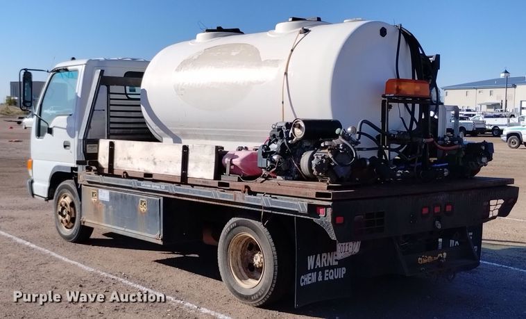 image for item DQ6172 2002 Isuzu  NPR flatbed truck