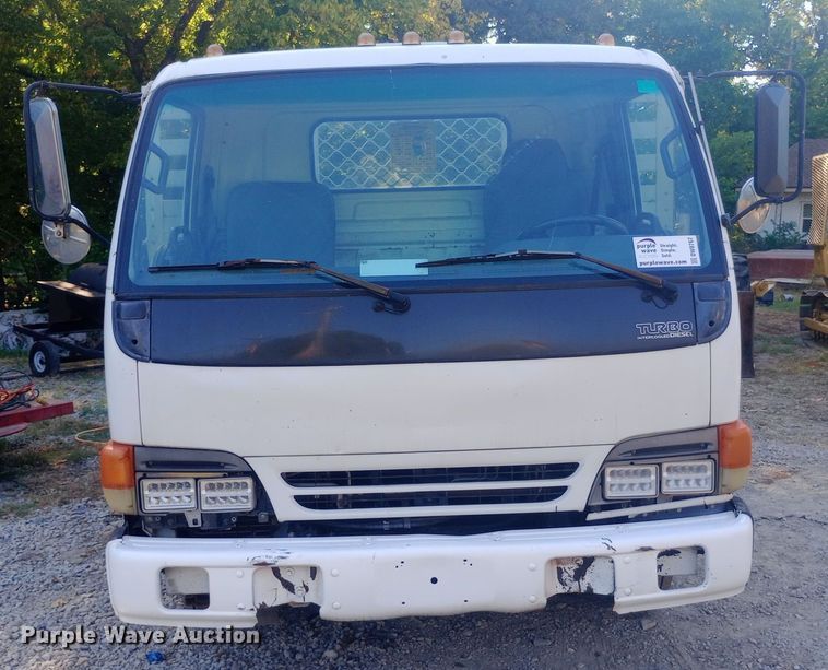 image for item DW0767 1996 Isuzu  NPR flatbed truck