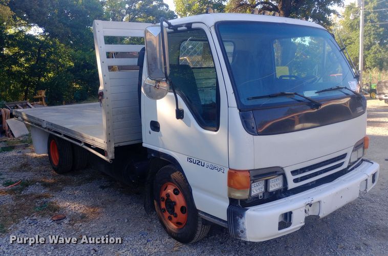 image for item DW0767 1996 Isuzu  NPR flatbed truck