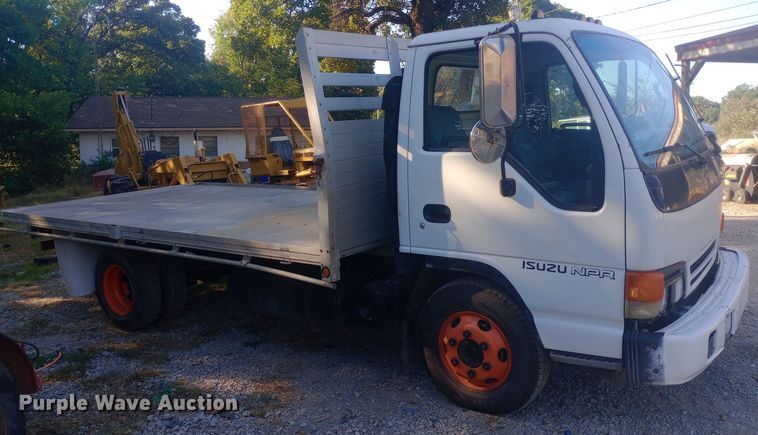 image for item DW0767 1996 Isuzu  NPR flatbed truck