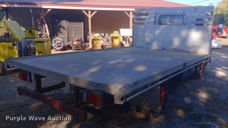 image for item DW0767 1996 Isuzu  NPR flatbed truck