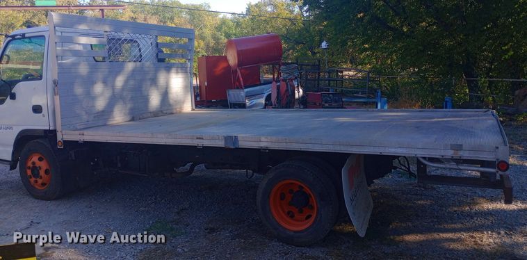 image for item DW0767 1996 Isuzu  NPR flatbed truck