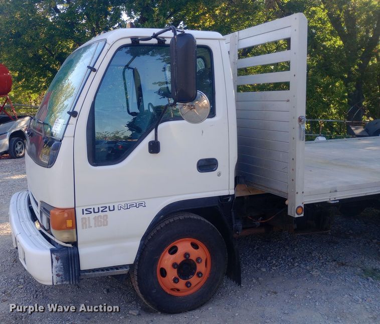 image for item DW0767 1996 Isuzu  NPR flatbed truck