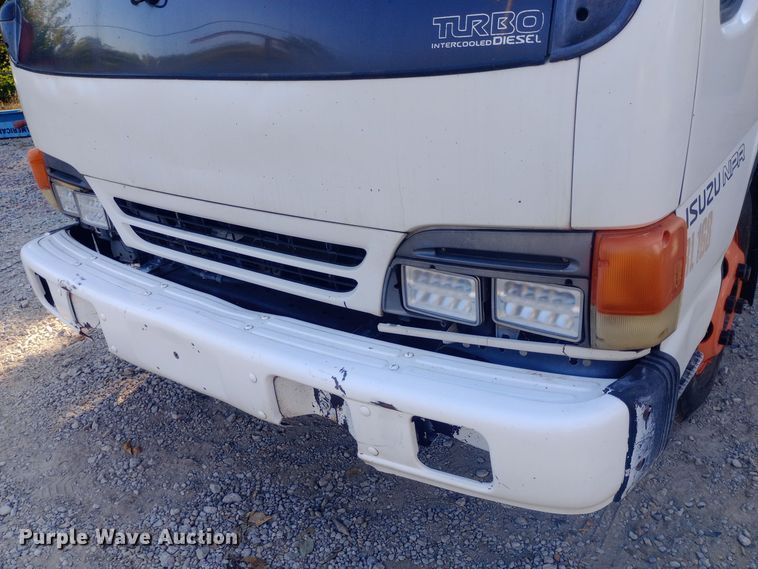 image for item DW0767 1996 Isuzu  NPR flatbed truck