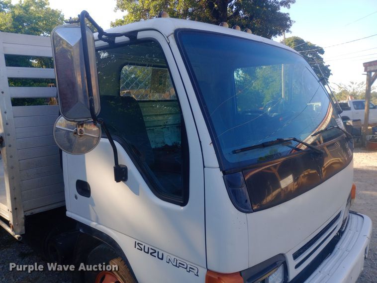 image for item DW0767 1996 Isuzu  NPR flatbed truck