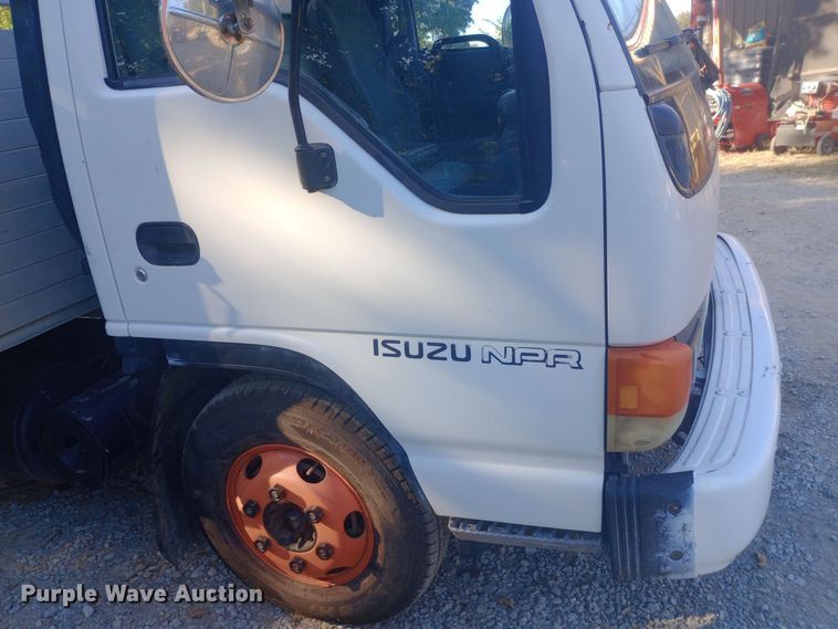 image for item DW0767 1996 Isuzu  NPR flatbed truck