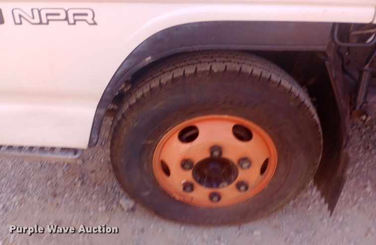 image for item DW0767 1996 Isuzu  NPR flatbed truck