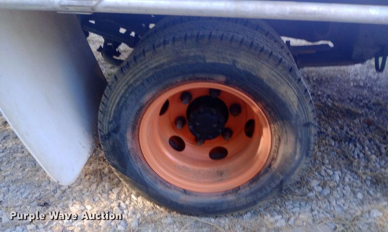 image for item DW0767 1996 Isuzu  NPR flatbed truck