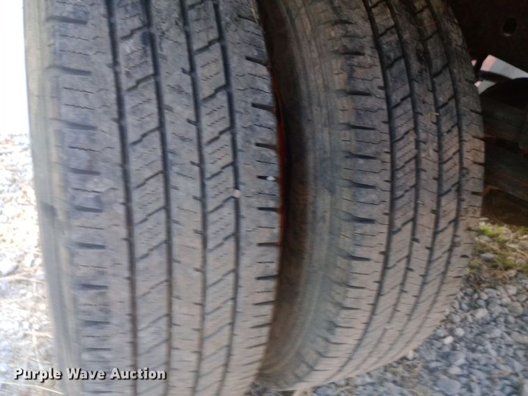 image for item DW0767 1996 Isuzu  NPR flatbed truck