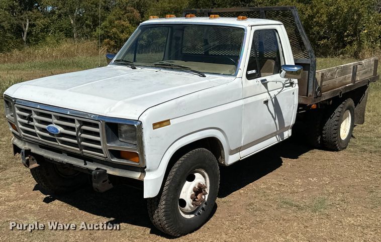 image for item DX1356 1984 Ford F350 dump flatbed pickup truck