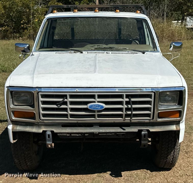 image for item DX1356 1984 Ford F350 dump flatbed pickup truck